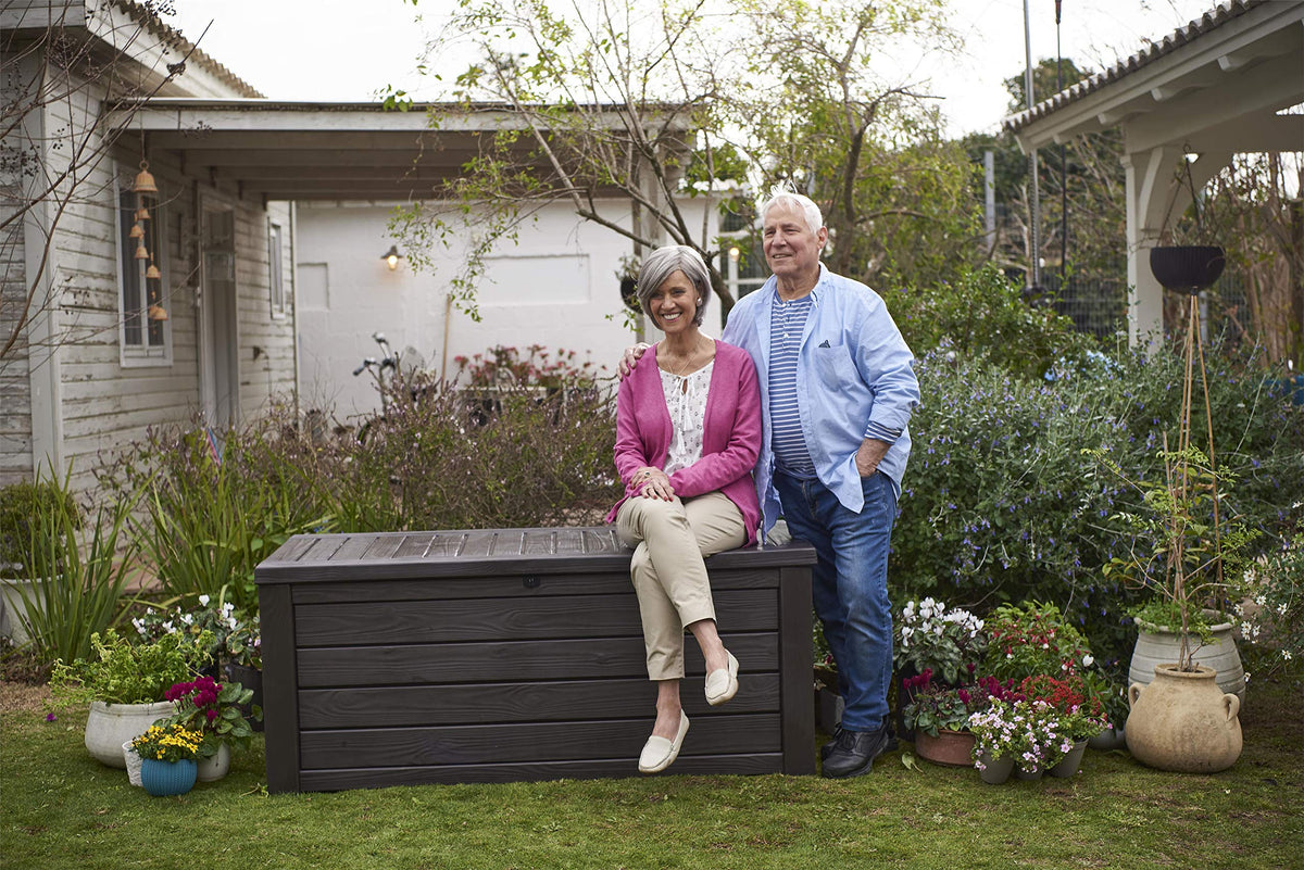 Keter Westwood 570L Outdoor 75% recycled Garden Furniture Storage Box Brown Wood Panel Effect ; Fade Free ; All Weather Resistant ; Safe and Secure ; Zero Maintenance ; 2 year Warranty